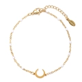 Detailed macro view of the golden stainless steel moon bracelet with white beads and clasp - White (XN320-WHITE)