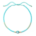 Bracelet œil porte-bonheur turquoise perlé avec cordon ajustable et accents dorés - Bleu clair