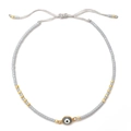 Bracelet fait main en perles grises avec pendentif œil bleu et détails dorés - Gris