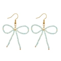Handmade light blue beaded bow earrings with gold accents and fishhook style drops - Grass Green
