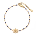 Golden stainless steel spider web bracelet featuring blue beads and adjustable chain - Spider Web Pendant With Blue Beads (XN331-BLUE)