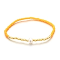 Pulsera elástica bohemia con cuentas de semillas amarillas y una perla de agua dulce real - Amarillo claro