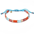 Colorful Tila beaded bracelet with orange, light blue and gold beads on blue cord - Orange and Blue (XN304-4)