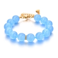Elegante pulsera de cuentas de calcedonia azul con cierre de langosta dorado y cadena - Azul