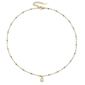 Detail van vergulde stalen ketting met emaille kralen en een heldere kristallen hanger - Gouden Ketting Zwart-Witte Kralen (XN0153-7)