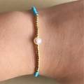 Adjustable Miyuki bead bracelet with golden pearls and sky blue accents for women - Light Blue