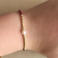 Minimalist Miyuki pearl beaded bracelet with golden beads and red silk cord detail - Burgundy