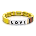 Close-up of rainbow enamel cube bracelet with LOVE letters and gold spacers - Yellow Patchwork LOVE Letter Style (SL057-1)