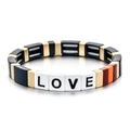 Macro shot of colorful enamel tile bracelet featuring white LOVE letter beads and gold spacers - Wine Red Patchwork LOVE Letter Style (SL057-4)