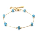 Gold plated stainless steel beaded bracelet with seven irregular translucent blue stones - Raw Blue Stone (XN569-9)