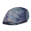 Flat lay of retro blue and mustard yellow marble patterned cotton newsboy cap on white background - Adjustable / Blue
