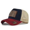 Detailed close-up of navy mesh baseball cap with leather patch and contrast stitching - Burgundy & Navy