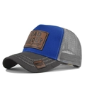 Detail of DAD leather patch and embroidery on two-tone breathable mesh trucker hat - Dark Grey/Blue
