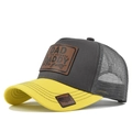 Detail of grey mesh trucker hat with yellow brim and leather DAD patch embroidery - Yellow & Dark Gray