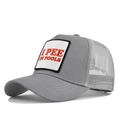 Detail of grey mesh trucker hat featuring red I PEE IN POOLS embroidery on white patch - Adjustable / Light Gray