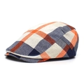 Close-up of orange and navy plaid beret showing the breathable cotton blend texture - Adjustable / Orange