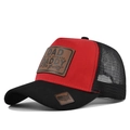 Red and black trucker hat featuring a leather DAD patch and mesh back design - Black and Red