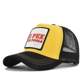 Detail of a yellow trucker hat with black mesh and funny I PEE IN POOLS embroidered patch - Adjustable / Black Yellow
