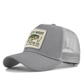 Detail view of grey trucker hat featuring fish embroidery patch and breathable mesh back - Light Gray