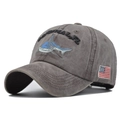 Detail view of 3D shark embroidery and Sanibel text on washed vintage baseball cap - Adjustable / Coffee
