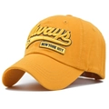 Primer plano de gorra de béisbol amarilla con bordados Always 75 y New York City - Ajustable / Amarillo