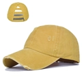 Detail of bright yellow distressed ponytail baseball cap with multiple horizontal rear openings - Adjustable / Yellow