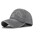 Close-up of the vintage washed grey cotton baseball cap with ROUTE 66 shield embroidery - Adjustable / Gray