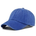 Close-up of blue washed cotton baseball cap showing 6-panel structure and vintage texture - Sapphire Blue