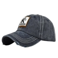Nahaufnahme einer Vintage-Baseballkappe in Dunkelblau mit K&K-Patch und abgenutzter Krempe - Verstellbar / Marineblau