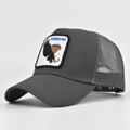 Detail view of the gray trucker hat featuring FREEDOM text and embroidered eagle patch - Adjustable / Dark Gray