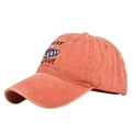 Detail of vintage washed orange cotton cap with SURF WAVE surfboard embroidery texture - Orange