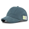 Détail de la casquette de baseball en coton sarcelle avec étiquette décorative - Vert Militaire