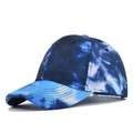 Detail view showing tie-dye pattern and reinforced stitching on blue canvas baseball cap - Adjustable / Navy Blue