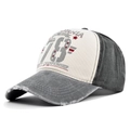Detail of vintage washed graffiti baseball cap featuring distressed edges and 78 print - Adjustable / Grey + Black