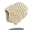 Detailed macro view showing vertical ribbed texture of a beige knitted winter earflap hat - Beige