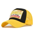 Close-up of Western embroidery patch on yellow and black mesh trucker baseball cap - Adjustable / Yellow