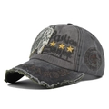 Detailed close-up of distressed cotton fabric with Fashion embroidery and 1988 patch - Adjustable / Army Green