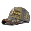 Detailed close-up of vintage skull embroidery and distressed brim on baseball cap - Adjustable / Coffee