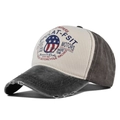 Detailed view of vintage moto graffiti print with distressed edges on a baseball cap - Adjustable / Black and Coffee