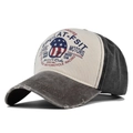 Detailed close-up of distressed brim and vintage moto graffiti print on baseball cap - Adjustable / Coffee + Black
