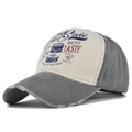 Close-up of distressed brim and vintage graffiti print on color-block baseball cap - Adjustable / Gray