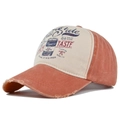 Close-up of distressed brim and vintage graffiti print on a contrast baseball cap - Adjustable / Orange