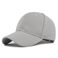 Detailed side view of a structured light grey baseball cap with clean stitching and curved brim - Adjustable / Gray