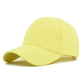 Detailed side view of a lemon yellow baseball cap with curved brim and breathable eyelets - Adjustable / Yellow
