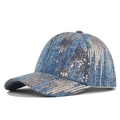 Detail shot of blue denim texture baseball cap featuring vertical golden sequins patterns - Light Blue Denim Sequin