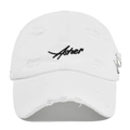 Close-up of Asher embroidery and metal rings on distressed white baseball cap - One Size / White