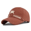 Detail shot of vintage brown baseball cap with RR embroidery and distressed ripped texture - Orange