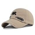 Detailed view of distressed beige canvas baseball cap with black RR embroidery and ripped style - Khaki