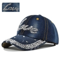 Close-up of sparkling rhinestone Love lettering and crystal details on denim baseball cap - Love Rhinestone Decoration / Navy Blue - Love Style