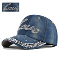 Detailed view of blue denim baseball cap with silver rhinestones and metal rivets - Love Rhinestone Decoration / Blue - Love Style